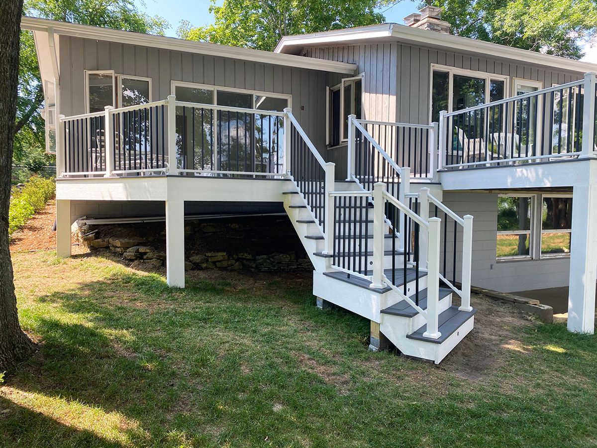High quality deck with tiered stairs built by Carter Custom Construction, your trusted deck & porches builder in the Twin Cities.