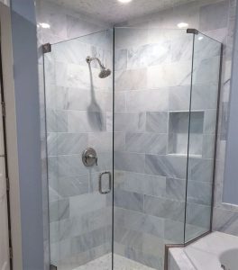 Custom-Bathroom-Shower_Remodeling_St-Paul_MN White and gray marble tile shower with glass surround and door, built and installed by Carter Custom Construction