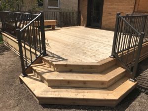 custom built wide deck and stairs, built by Carter Custom Construction