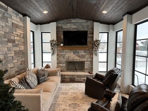 four-season-porch-addition-minneapolis_carter-custom-construction four season porch addition with fireplace, built by Carter Custom Construction