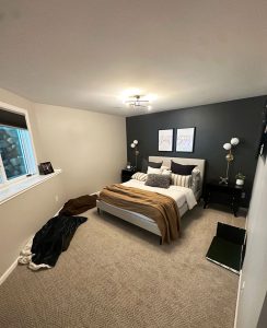 twin-cities-custom-basement-bedroom-remodel basement bedroom remodel with dark gray accent wall by Carter Custom Construction