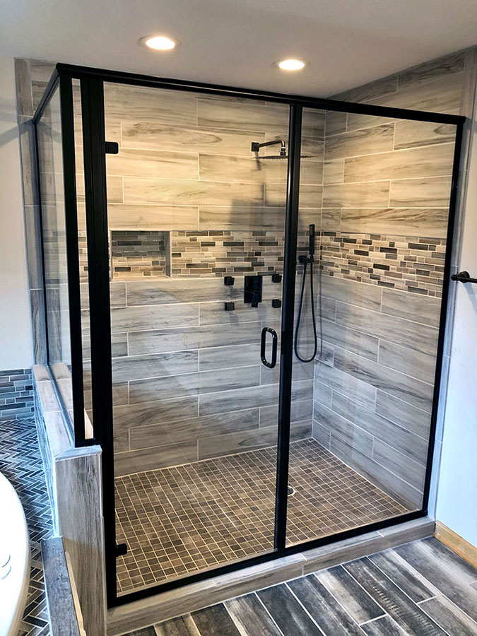Photograph of a finished bathroom remodel (focused on shower) in Forest Lake, completed by Carter Custom Construction